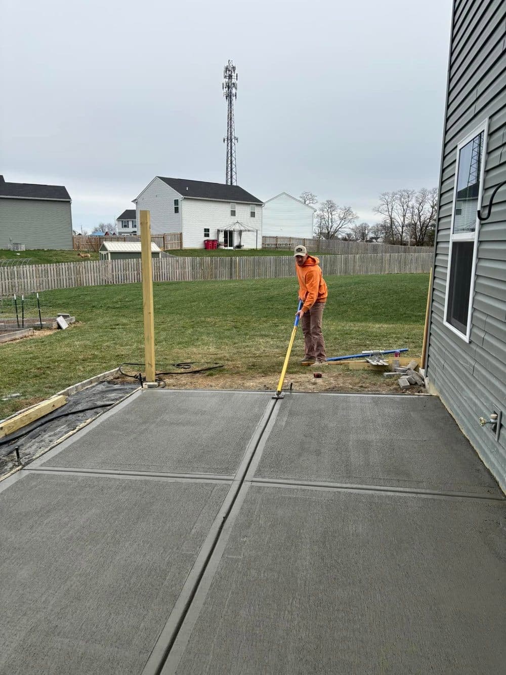 Apex crew setting up a concrete patio pour